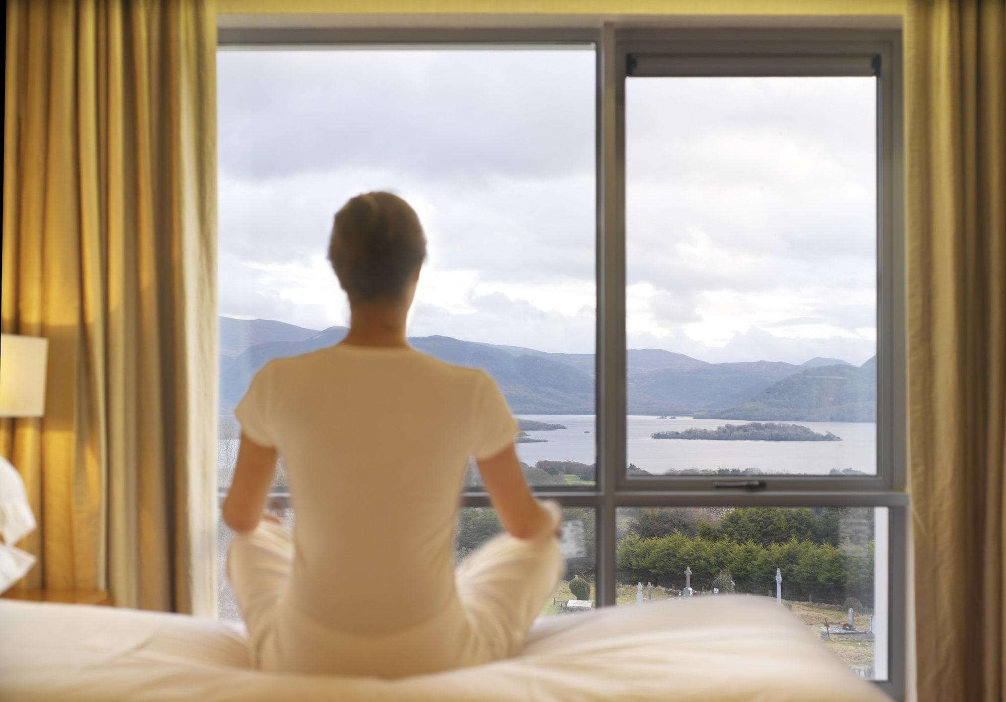 Aghadoe Heights Hotel & Spa Killarney Exterior photo A woman meditating
