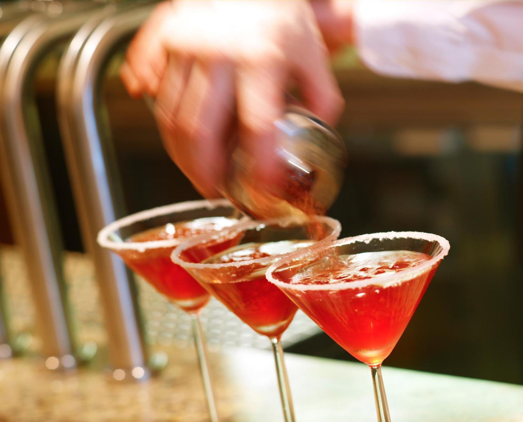 Aghadoe Heights Hotel & Spa Killarney Exterior photo A bartender seasoning a cocktail rim with a lemon wheel